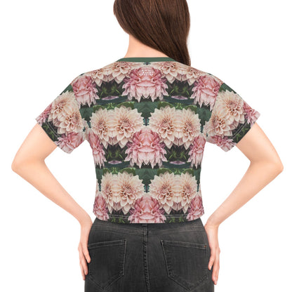 Woman wearing a floral patterned top on a white background