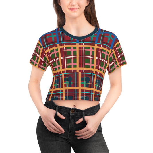 Woman wearing a plaid crop top on a white background