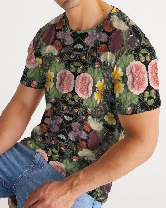 Black Botanica No 1 men’s tee with vibrant symmetrical pink yellow and purple floral pattern on dark green leaves