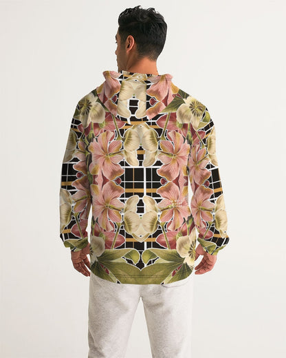 A man wearing a Botanica Plaid No 1 men’s windbreaker with a vibrant floral pattern on a black grid background