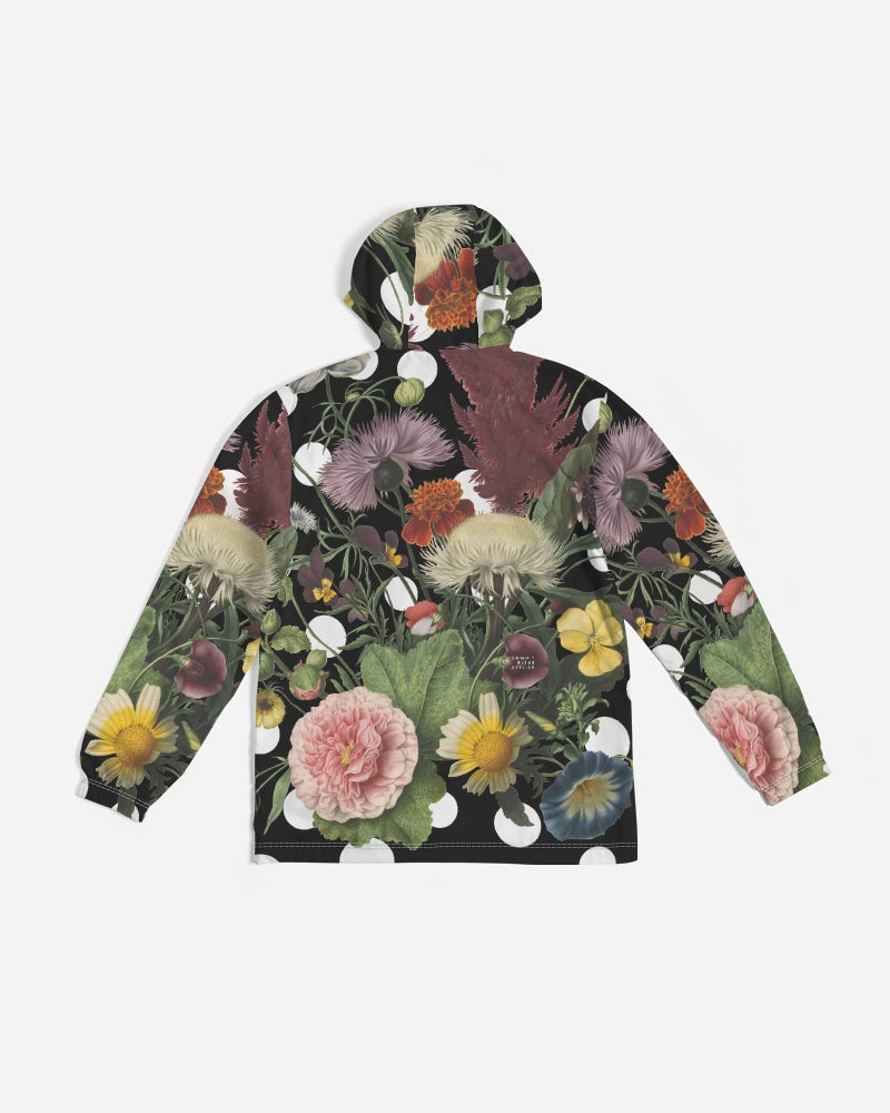 Botanica pop men’s windbreaker black hooded jacket with vibrant floral pattern of pink peonies yellow daisies and purple blossoms
