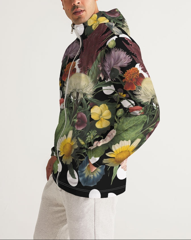 Botanica pop men’s windbreaker in black hooded jacket with vibrant yellow orange purple and green floral print