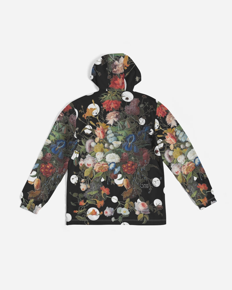 Black hooded dutch redux no 1 pop men’s windbreaker with vibrant red pink blue and white floral pattern on dark background