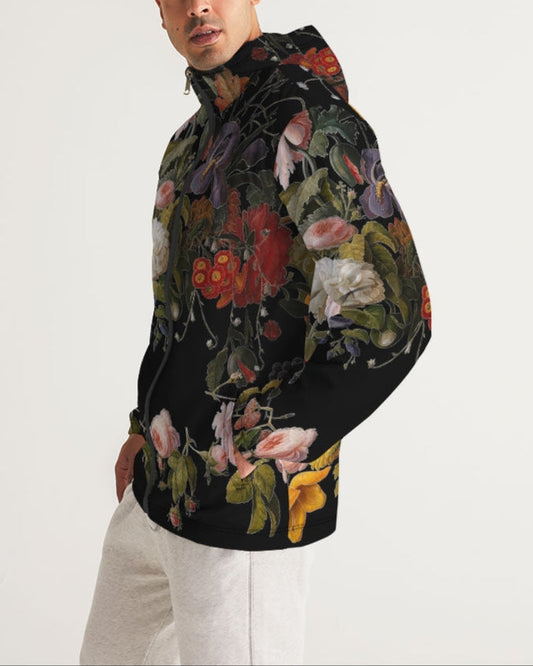 Black hooded dutch redux no 2 men’s windbreaker with vibrant floral print and dark green foliage detailing