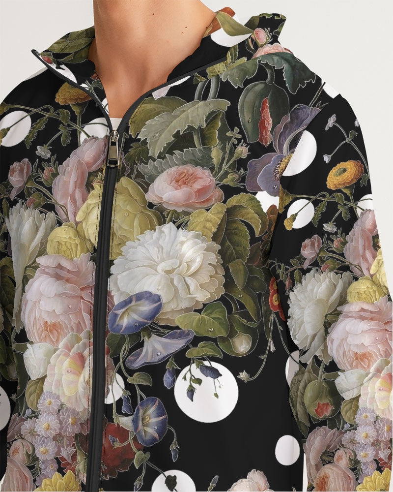 Black zip-up Dutch Redux No 2 Pop men’s windbreaker with vibrant floral pattern and white polka dots