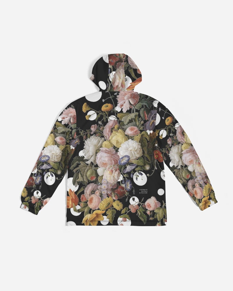 Black hooded dutch redux no 2 pop men’s windbreaker with vibrant pink white yellow green floral pattern and circular cutouts