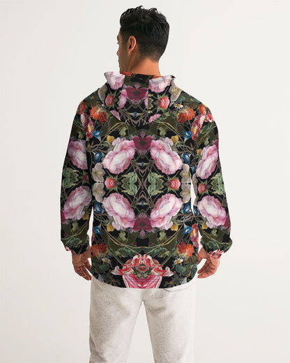 A man wearing a black Dutch Redux No 3.2 men’s windbreaker with pink rose floral pattern on the back side