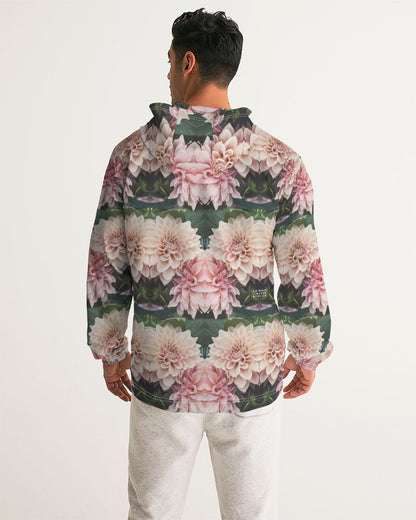 A man wearing a floralis no 26 men’s windbreaker with a vibrant pink and white dahlia floral pattern on dark green leaves