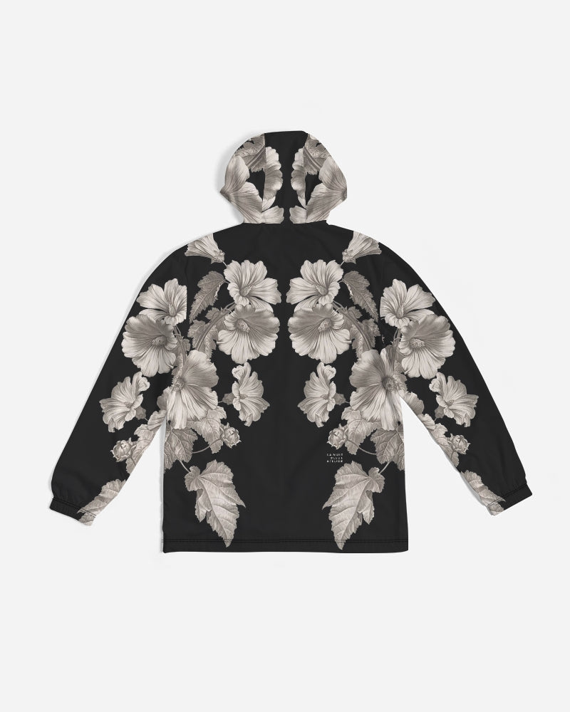 Noir Botanica No 1.2 men’s black windbreaker hoodie with detailed grayscale floral pattern on front and sleeves