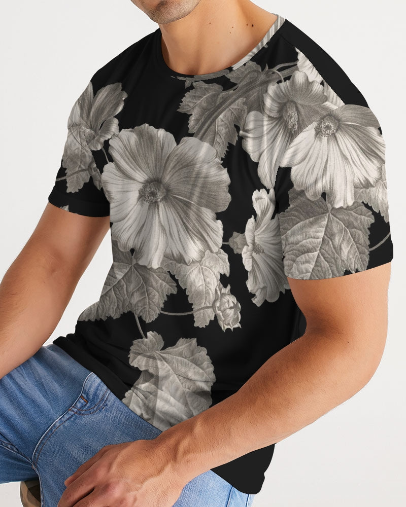 Black short-sleeved men’s tee with detailed grayscale floral pattern featuring large blossoms and leaves noir botanica no 1
