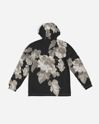 Noir Botanica No 1 men’s black hooded windbreaker with bold gray and white monochromatic floral pattern