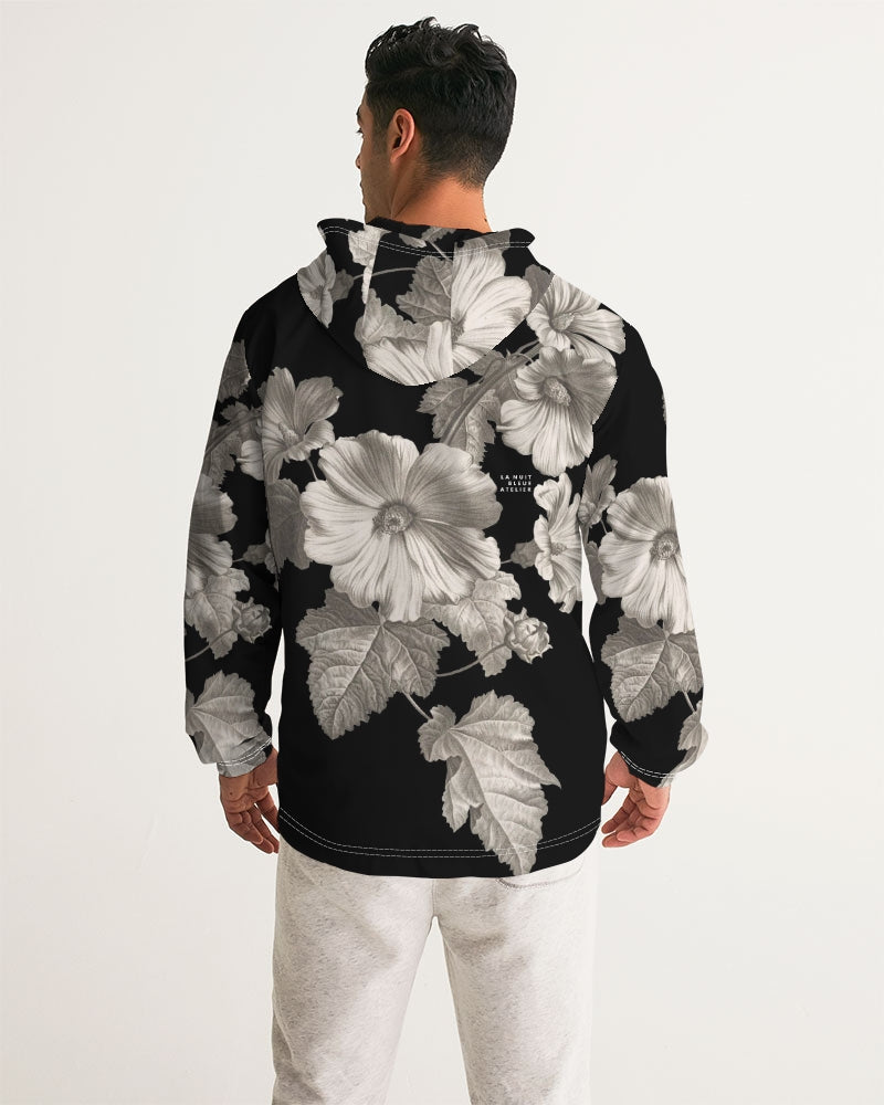 Noir Botanica No 1 men’s windbreaker black hoodie with bold grayscale floral pattern of large blossoms and leaves